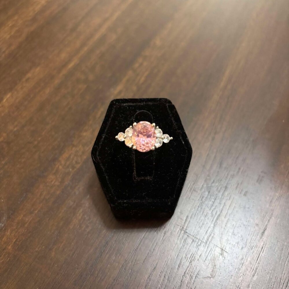 Pink Zirconia Oval Cut with White Zircon Accents on a Sterling Silver Setting